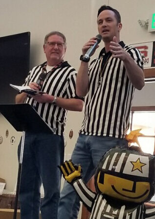 Tim Kirsch, left, and Todd Miller served as MC and auctioneer at the annual scholarship auction.