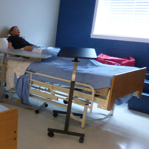 The health services area at Willamette Career Academy includes realistic settings and artificial patients for training purposes.