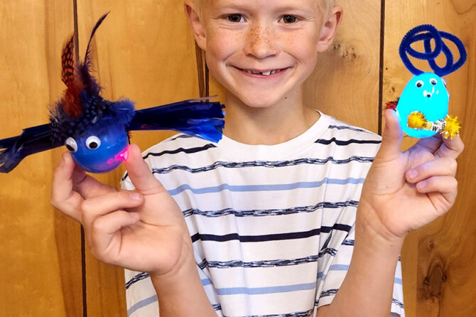 Gabe Blatter created lighted critters at last month’s STEAM activity at Scio Public Library.