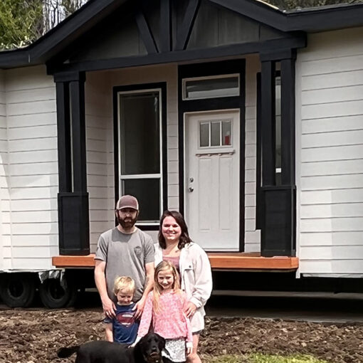 Donny White and Tracy Stevens-White, are happy to be in their new home in time for Christmas with their children, Emmett and Dayne, and their family dog, Norman.