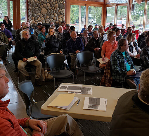 A crowd of approximately 50 people gathered at the Gates Fire Hall on Saturday, March 25, for a meeting about the Santiam Canyon’s wildfire recovery plan. At lower left are Councilors Denny Nielsen and Eric Page of Detroit. James Day