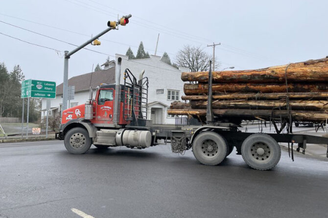 A logging truck makes a turn onto Highway 226 in Scio. ODOT is conducting an online survey on possible safety improvements in Scio, Lyons and Mill City. Submitted PHOTO
