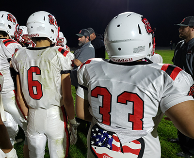 Santiam football coach Josh Ruby talks to his squad after a game at Colton last October. The Wolverines open this season Sept. 1 with a game against an opponent to be determined. James Day