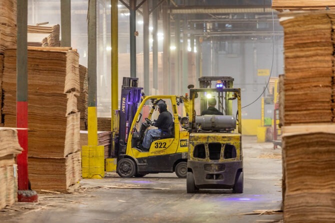 Freres fork lift operators handle products at a Freres Engineered Wood facility. The Lyons-based company is hiring up to 40 additional workers.Freres engineered wood
