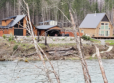 New construction is apparent along the Little North Santiam River in the Elkhorn-North Fork area, which was hit hard by the 2020 wildfires.  JAMES DAY