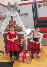 Echo and Cora Bodenstab told their mom they wanted to play elf and share their toys.      SUBMITTED PHOTO