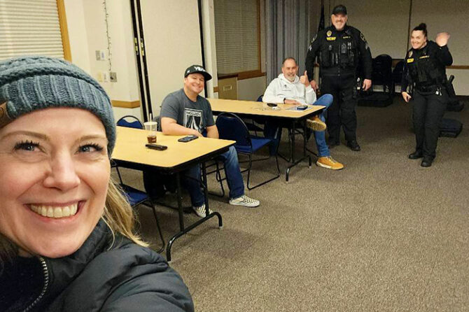 Kim Dwyer, left, Service Integration Team coordinator for Santiam Hospital, Adam Culbertson, owner of Home-Grown Remedies, Stayton Mayor Brian Quigley and Sgt. Dean Butler and Sgt. Sofia Bilenberg of the Stayton Police Department are shown at the temporary warming center at the Stayton Public Library. The center opened Friday night and operated through Tuesday. Submitted Photo