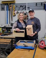 Nancy and Doug Kelly display the kits that kids and adults can purchase to make at Art Mart tomorrow. SUBMITTED PHOTO
